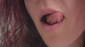 Smoking cheekily, smelling the full ashtray!