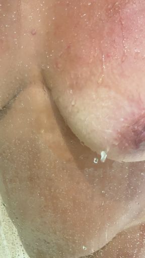 Wet tits in a sweaty shower window