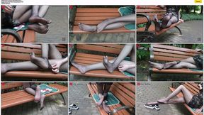 Internet celebrity beauty Liu Er wears a sexy slim cheongsam and black ultra-thin pantyhose to show off her long legs and beautiful feet on a bench in the park