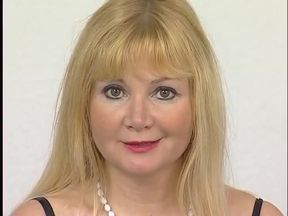 Blonde mature wearing bodystockings dildoing her slightly hairy pussy