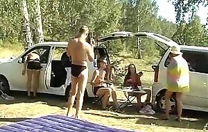 Lewd couple of naked students fucking in the tent