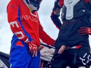 Hot motocross boys cum near motorcycle