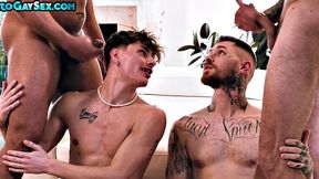 Tattooed anal stud and twink barebacked in orgy for facial