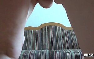 Mature licks a condom and fingers herself