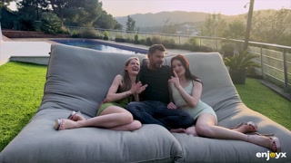 Petite girls Tiffany Tatum and Matty Perez share one big dick outdoors, sucking and fucking on the lawn