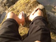 Boy cumming on his feet in flip flops after wanking outdoors. Foot fetish video