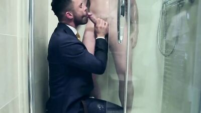 Naughty businessman fucks his handsome gay co-worker in the shower