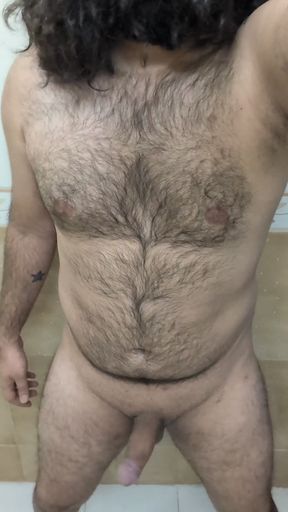 Hairy-chested Indian man exposes his cock
