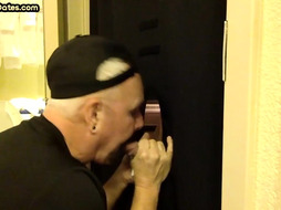 Gloryhole greedy amateur DILF sucks penis at his home