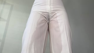 Girl in Heels Pees Herself in White Pants