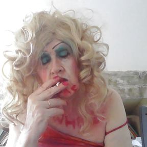 Total tramp, sissy fag, smoking fetish whore, Sarah, masturbates,with an 8inch dildo up her arse