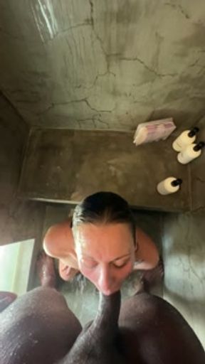 Howife deepthroats BBC that she met at the pool on vacation in the shower