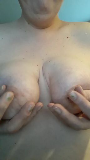 Pulling on Her Nipple Ring