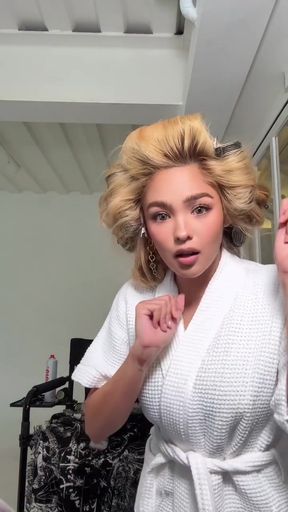 Filipina celebrity shows off her curvy figure in a solo scene