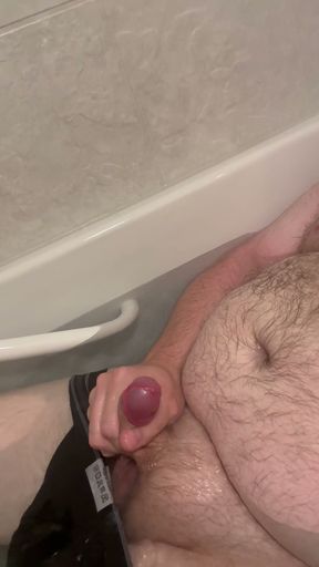Chubby Fat Bear plays with small uncut cock in bathtub   Clip 1