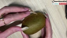 Nails scratching and piercing kiwi