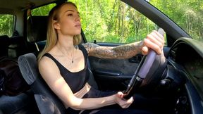 Chloe finds an old car on an empty road