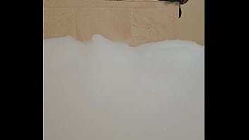 Solo Male Taking a Mega Bubble Bath