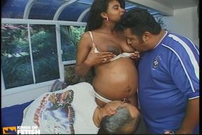 Two Guys Share Pussy and Mouth of a Pregnant Ebony