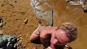 Stacy Firedoll gets a wet and wild blowjob at the beach