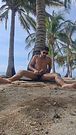 Cumming on the Caribbean beach
