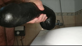 Big Dildo inserted full length balls and all. Comments please!!!