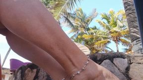 Magnificent feet with pronounced arches modeled on a beach (1)
