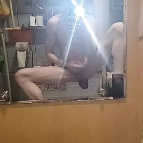 A young sexy guy jerks off a dick with giant prolapse (guts) from his hot ass in the toilet, looking at himself