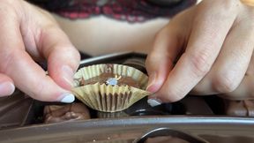 Giantess Valentine's Day Vore eating tinies from a chocolate box in lingerie