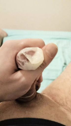 Jerking my dick and cum in a condom