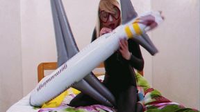 Alla inflates an inflatable plane and an inflatable stick with her mouth and fucks them hotly getting a real orgasm and Alla wears a diving mask and a wetsuit with fins!!!