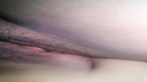 Hot young Asian girl shows off her perfect rear as she plays with a giant dildo