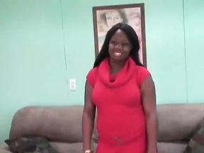 Beautiful black girl with a shaved pussy shows off her body and strips naked