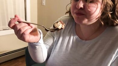 Her belly heaving as the cake crams her full stuffed fast