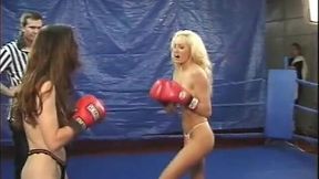 Real female boxing as blonde battles brunette with body punches, ney punches and breast punches