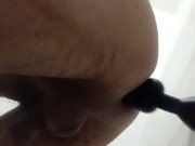 Kneading my ass with an anal plug in different poses.