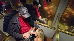 Blonde hottie gives a dirty BJ in public elevator