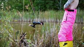 ”Lezdom babe in erotic ass fucking domination by a quiet serene river”