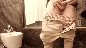 this amateur stud was dared to pee in a condom in the bathroom... fail! (piss spills everywhere when he takes it off :p)