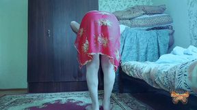 Cute shemale lifting skirt slightly in gentle breeze