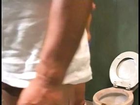 Muscular guy watches girlfriend urinate then gets blowjob while smoking cig