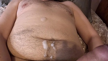 I stroke my cock while rubbing lotion all over my belly