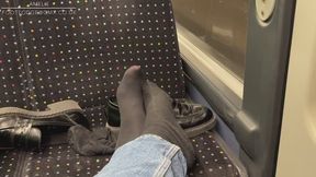 Stranger plays with my feet and takes off my socks in public on the bus