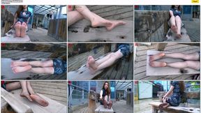 Nightclub DJ girl Shi Shi wears a sexy cheongsam and ultra-thin pantyhose and shows off her long legs and beautiful feet on a bench on the street