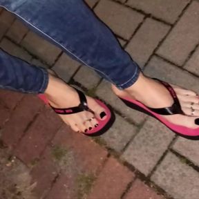 crossdresser in very sexy flip flops walks the street