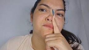 Sick girl makes her nose sniffle with mucus
