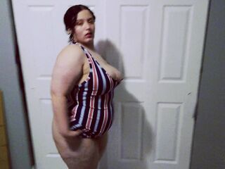 Hawt big beautiful woman tries on garments