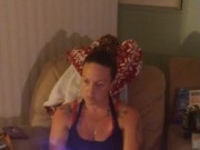 Beautiful girl in black mini dress lifts up her dress and play fortnite while smoking cigarettes