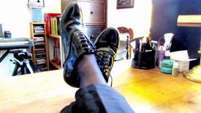 Gio wearing blue sheer socks and patent leather shoes