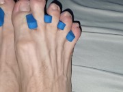 Skinny cute feet fingers stretched out bitten nails